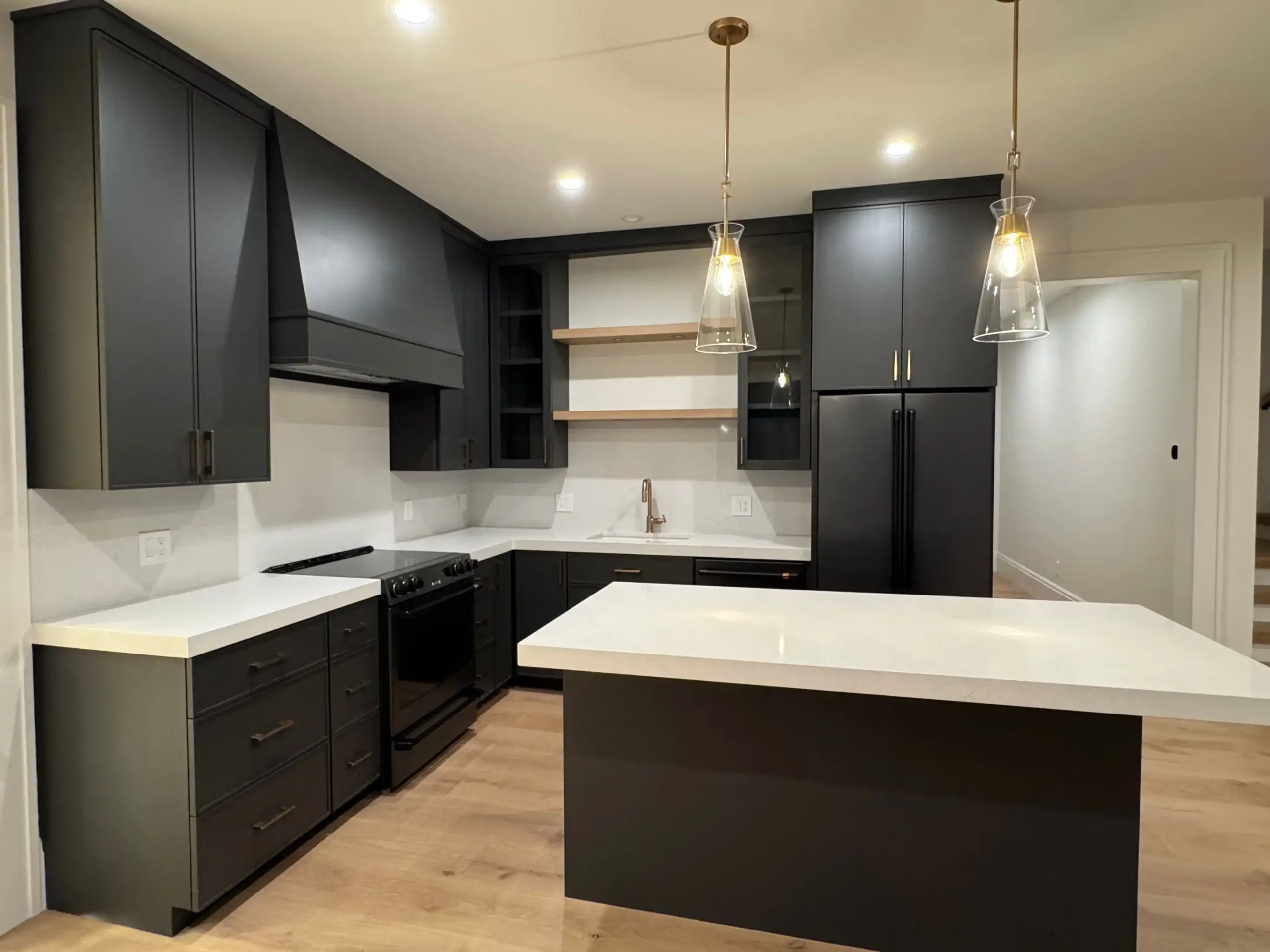 Minimalist Matte Black Cabinets with White Walls