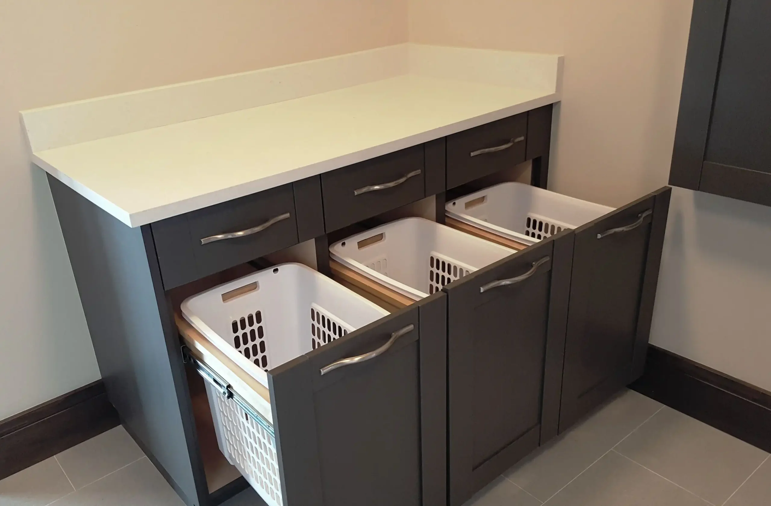 Organize Laundry Supplies with Pull-Out Bins